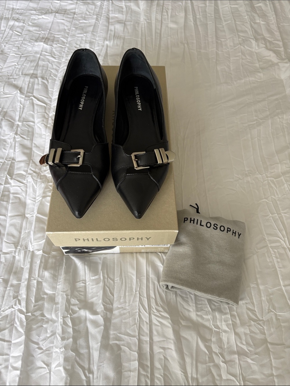 Philosophy Black Pointed Toe Buckle Flats with Silver Accent